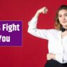 Young proud waitress woman butterfly on the neck and showing her muscle on red background.