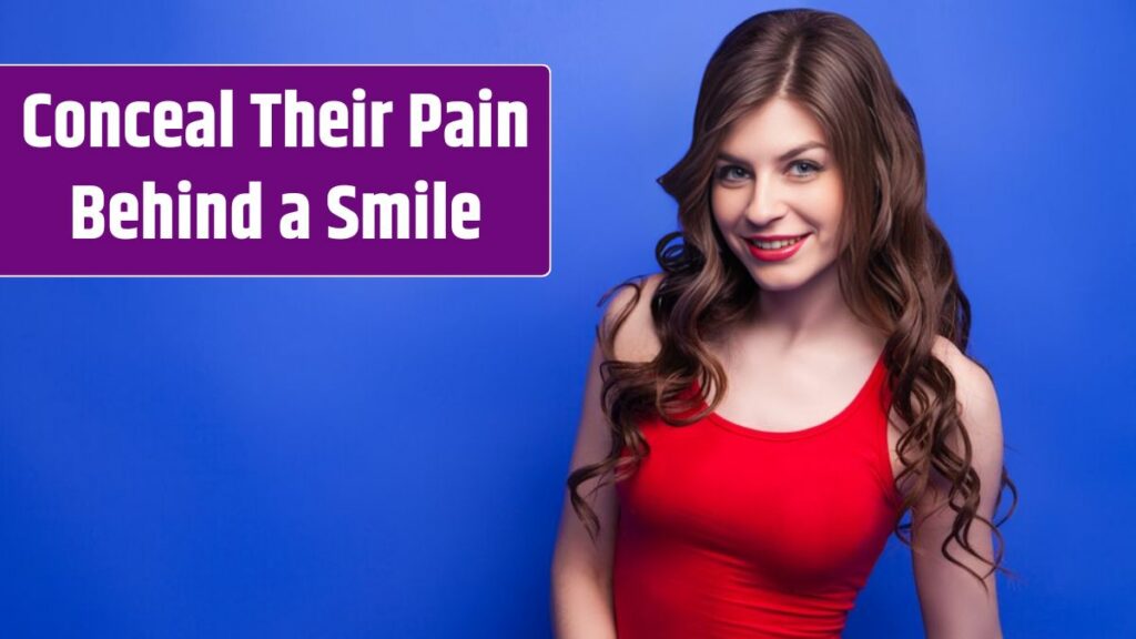 Portrait of beautiful young model in red top and red lips smiling at camera.