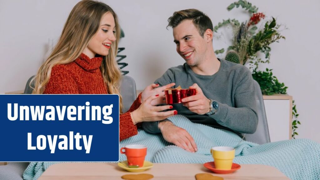 Man giving small gift to woman.